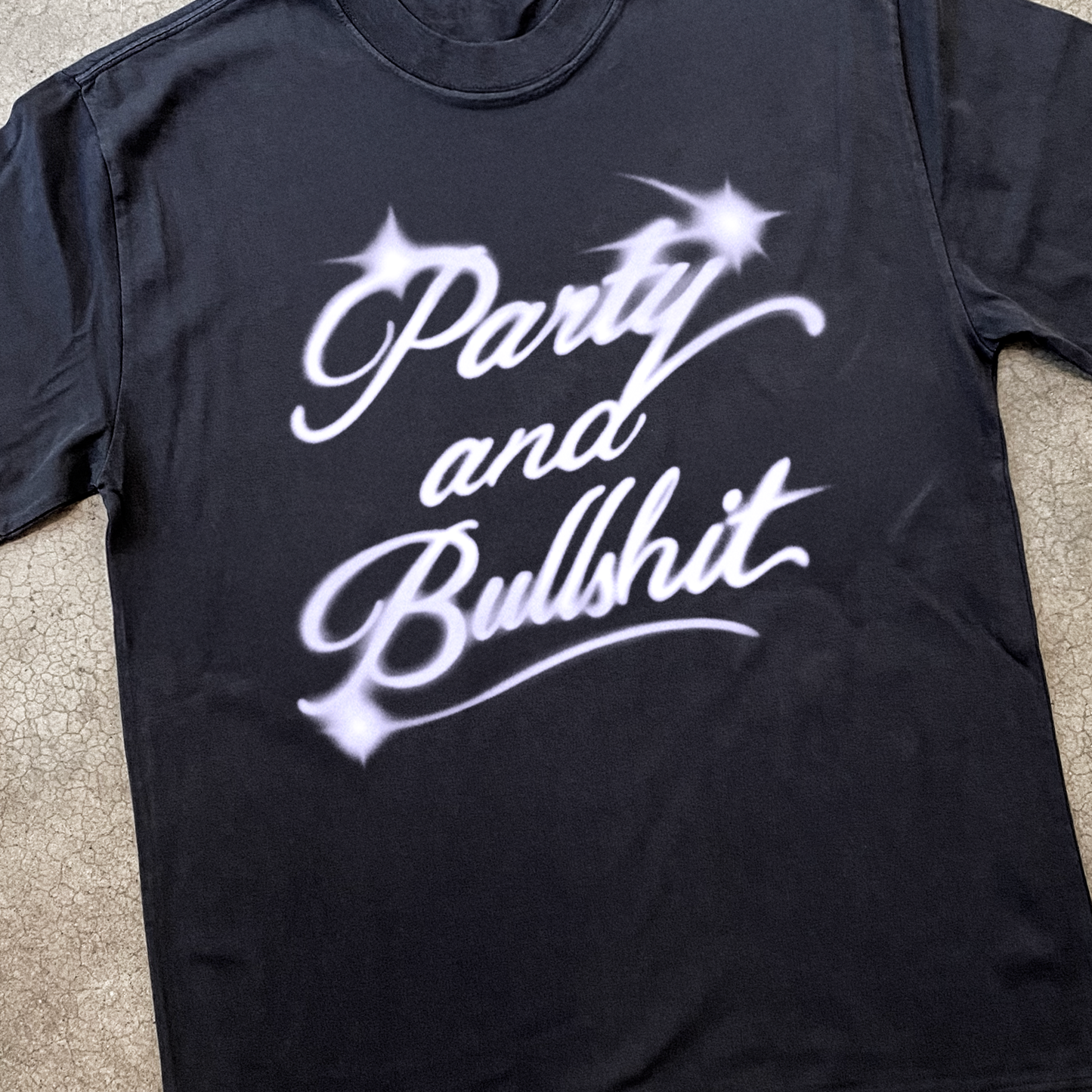 'PARTY AND BULLSHIT' AIRBRUSH HEAVY FADED BLACK TEE