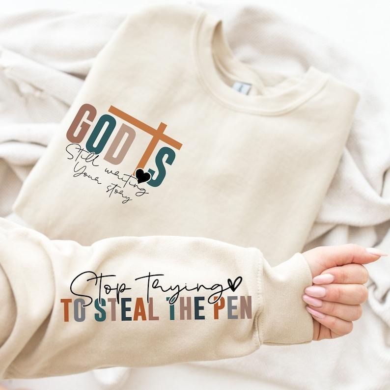 God is Still Writing Your Story T-Shirt, Inspirational Church Sweater, Christian Sweatshirt, Bible Verse T-shirt, sweater and Hoodie