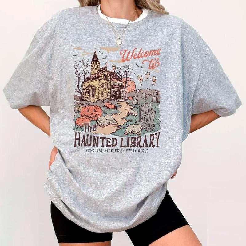 Haunted Library Shirt for Book Lover Funny Halloween Librarian Graphic Tee, Bookish Spooky Crewneck Reading Ghost T-Shirt Fall