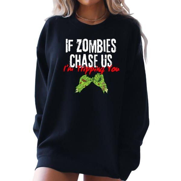 If "Zombies Chase Us, I'm Tripping You" Women's Graphic Tee - Tatted Witch Hand Design | Dark Gothic & Grunge Alt Aesthetic | Perfect for Tattoo Lovers & Dark Humor Fans | Sizes S-5XL | Edgy & Bold Statement Tee for Tatted Women | Unique Halloween Style