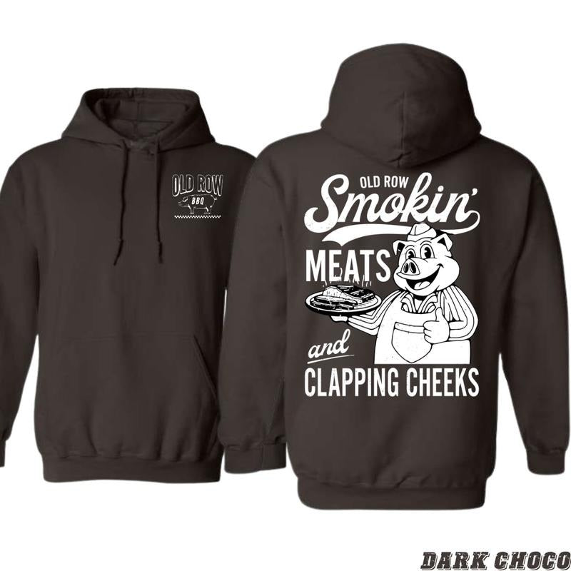 Old Row BBQ Smokin' Meats and Clapping Cheeks Black Unisex Hoodie - Ideal for BBQ Enthusiasts and Humor Lovers Menswear Sweaters