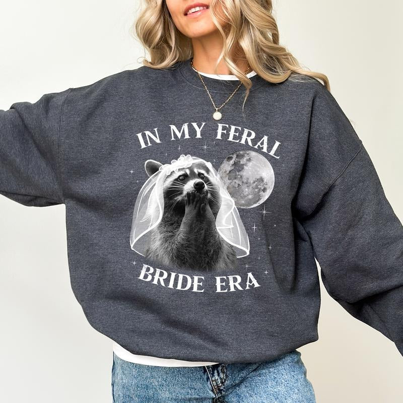 Vintage Y2K Raccoon Bride Sweatshirt, Funny Bride Crewneck, In My Feral Bride Era Sweatshirt, Feral Raccoon Bride Sweater, Bridal Meme Crewneck, Gift for Bride to Be, Comfy Long Sleeve Pullover, Unhinged Fabric Women's Tops, Soft Cozy Casual Womenswear