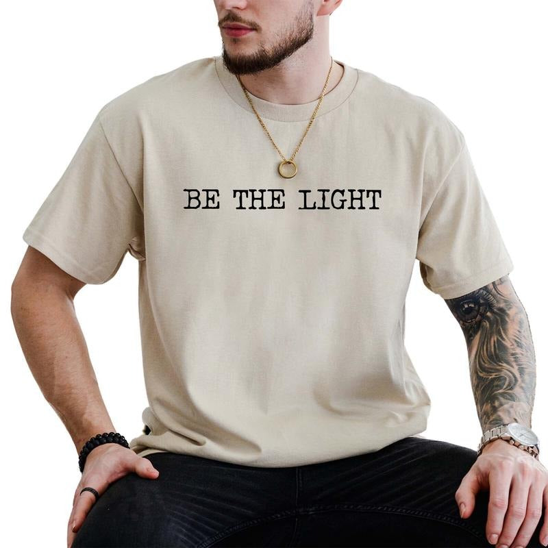 Be The Light Shirt, Christian Tee, Religious Graphic Printed Tee, Faith Shirt, Raccoon Tee, Matthew 5:14 Shirt, Bible Verse Tee, Casual Comfy Fabric Graphic Tee, Men's Top, Menswear, Cotton Fabric Relaxed Tee