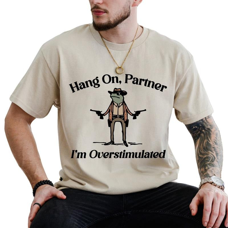 Hang On Partner I'm Overstimulated Graphic Tee, Funny Meme Frog T-shirt, Western Frog Meme Shirt, Funny Gift For Him