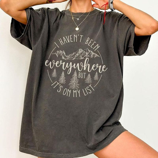 I Haven't Been Everywhere But It's On My List Comfort Shirt, World Traveler Shirt, Vacation Shirt, Adventure Shirt, Gift For Traveler, Funny Travel Shirt, Camping Shirt, Vacation Shirts, Travel Lover Tee, Advanture Women Tops